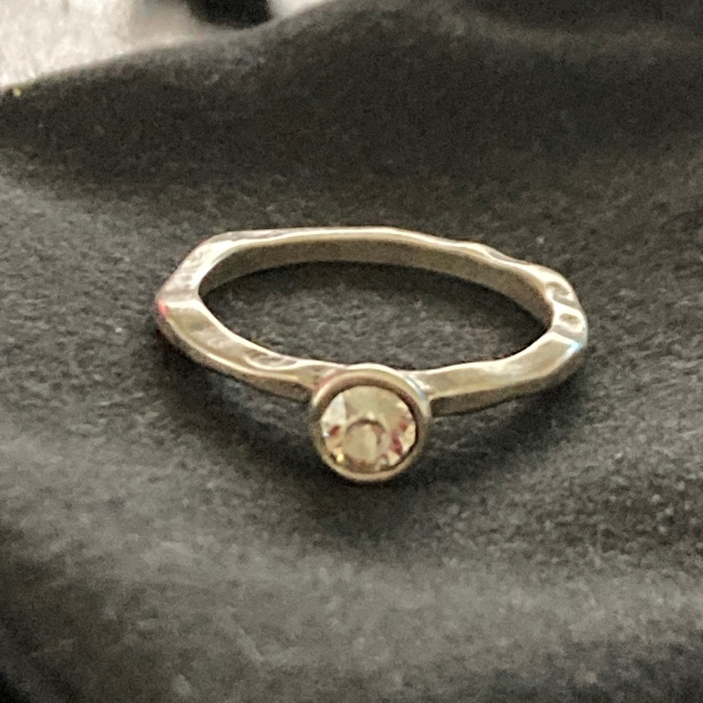 Hammered stainless steel ring with center crystal